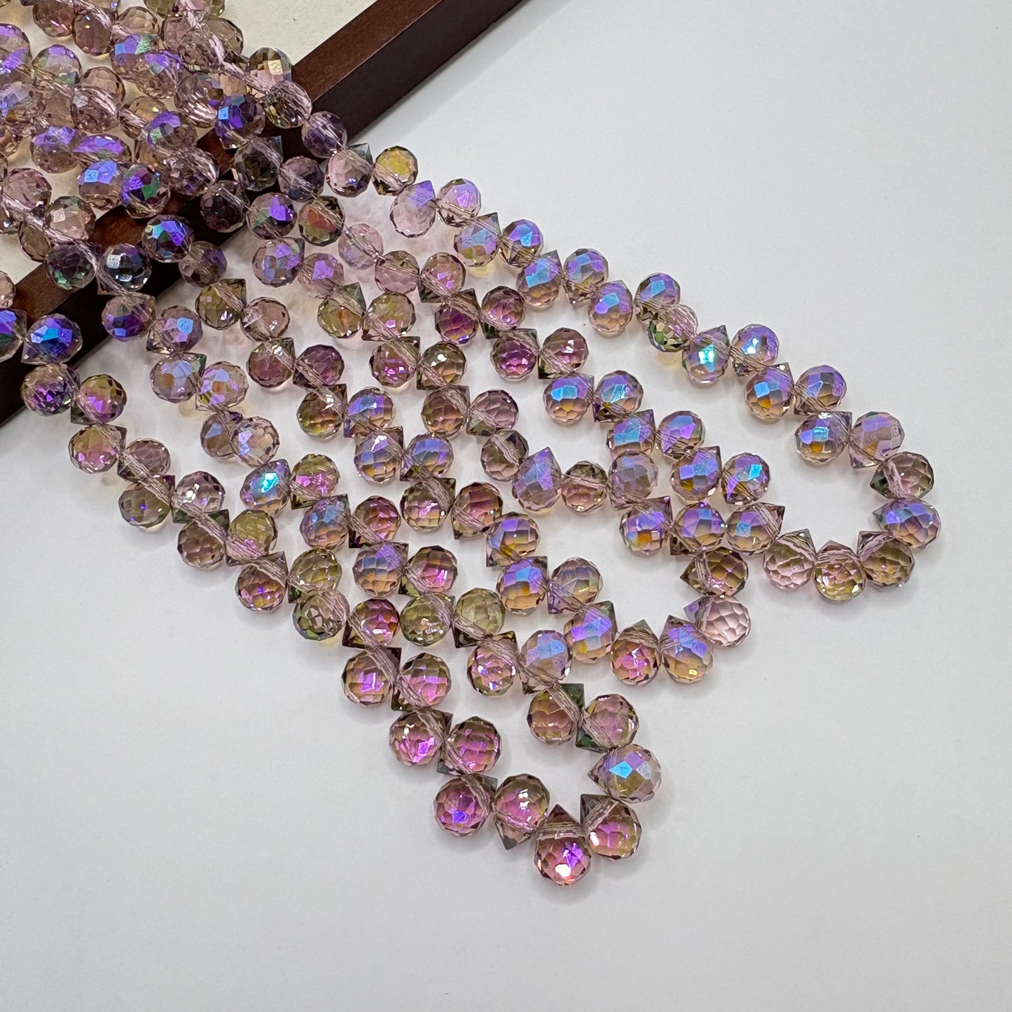 Blush Pink 049 fine-cut teardrop bead strand