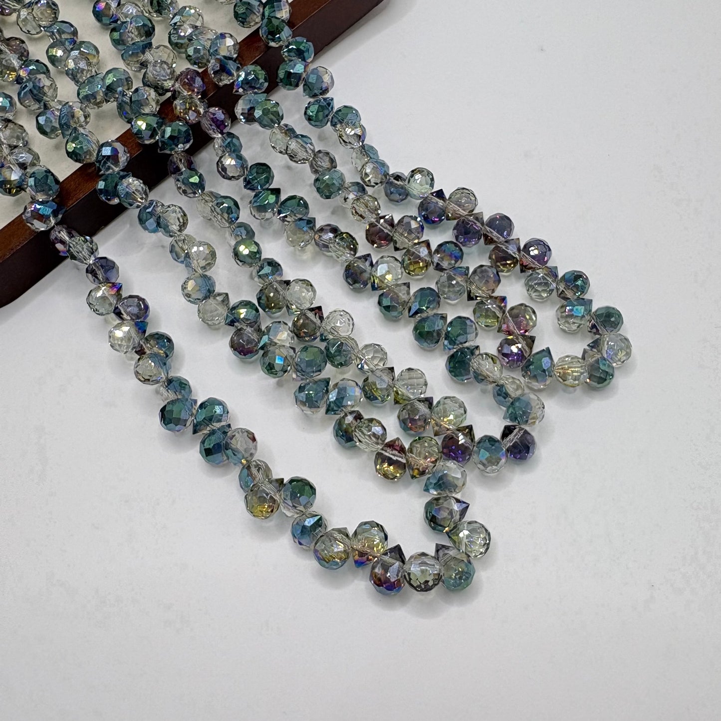 Blue Green 052 fine-cut teardrop bead strand