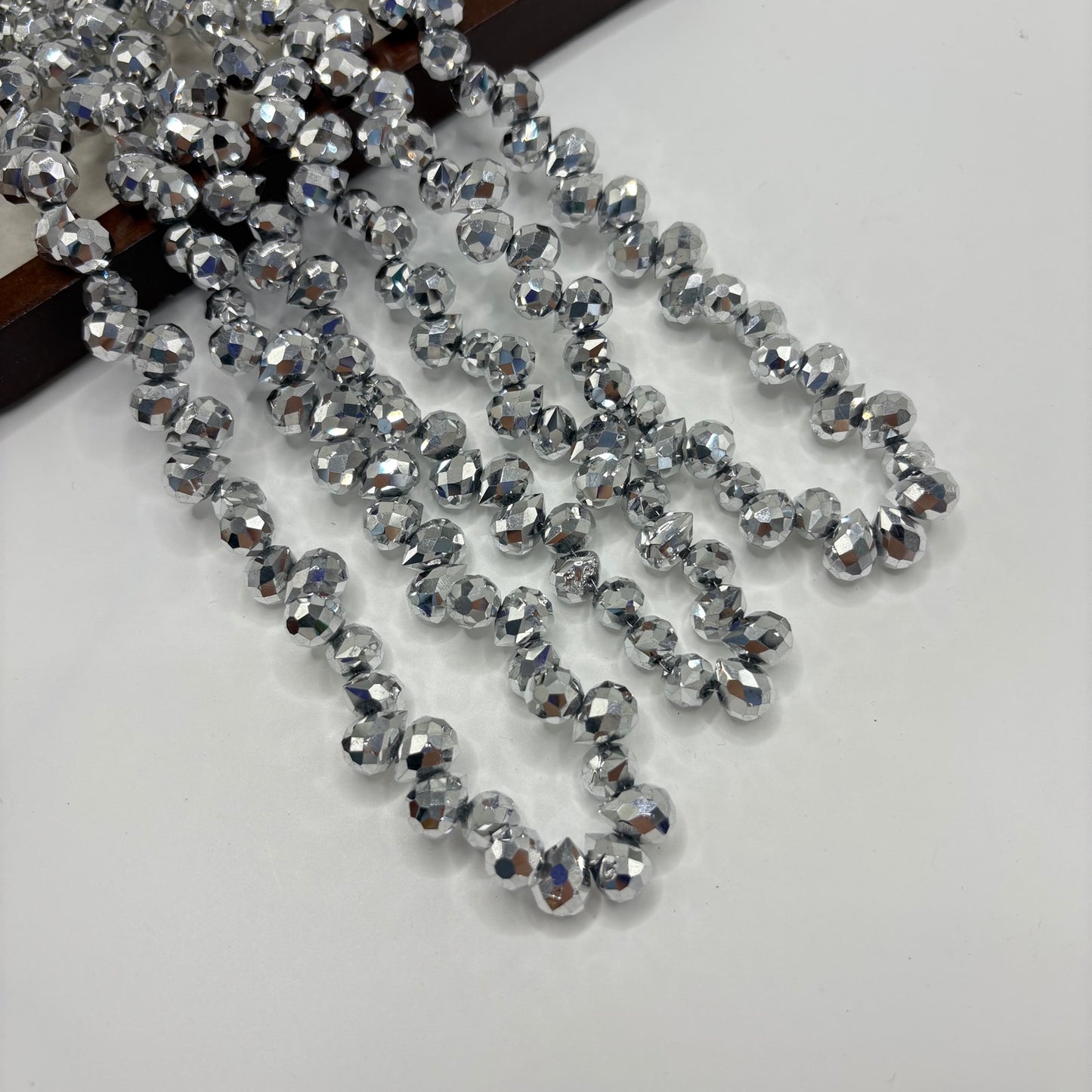 Silver Grey 054 fine-cut teardrop bead strand