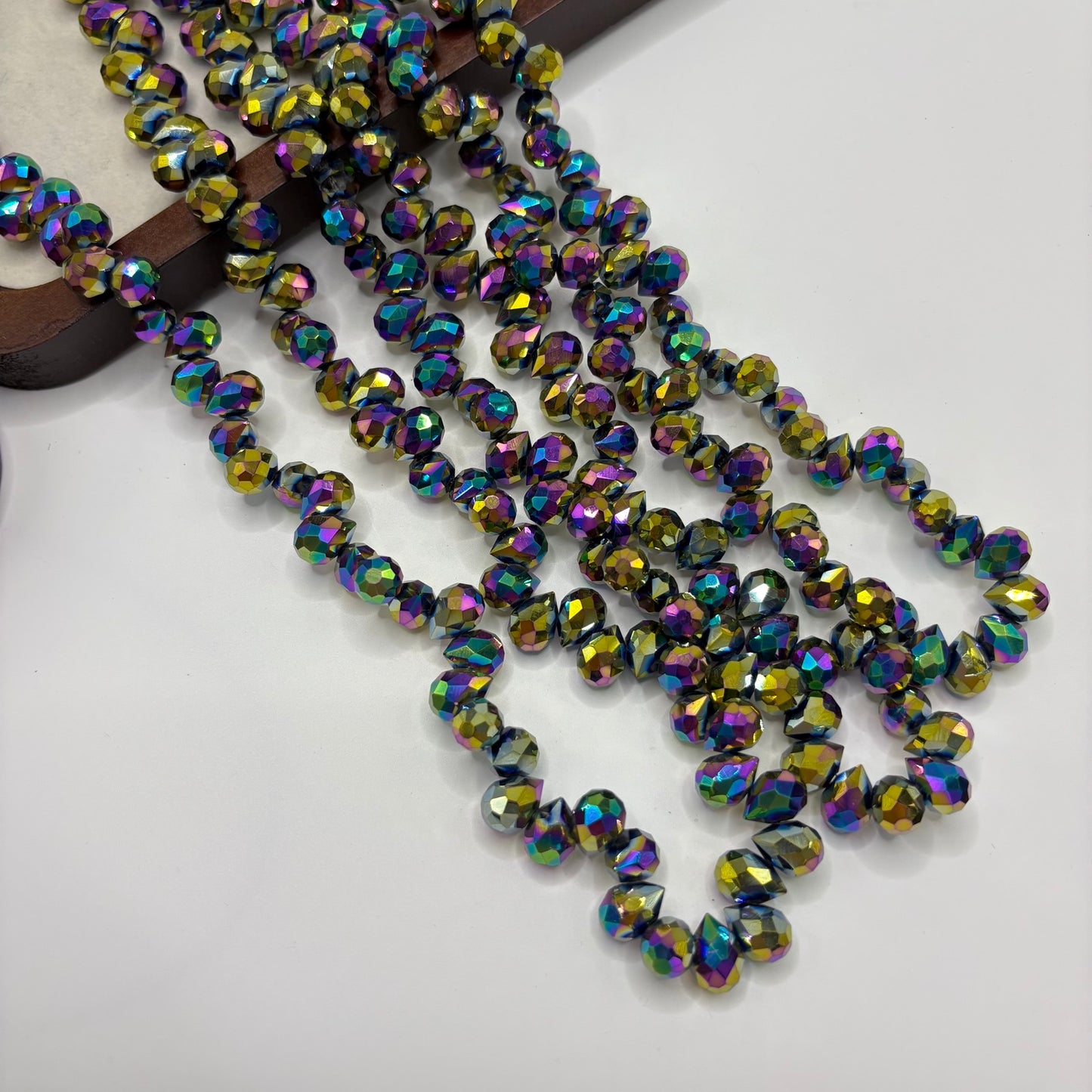 Multicolor AB 056 fine-cut teardrop bead strand