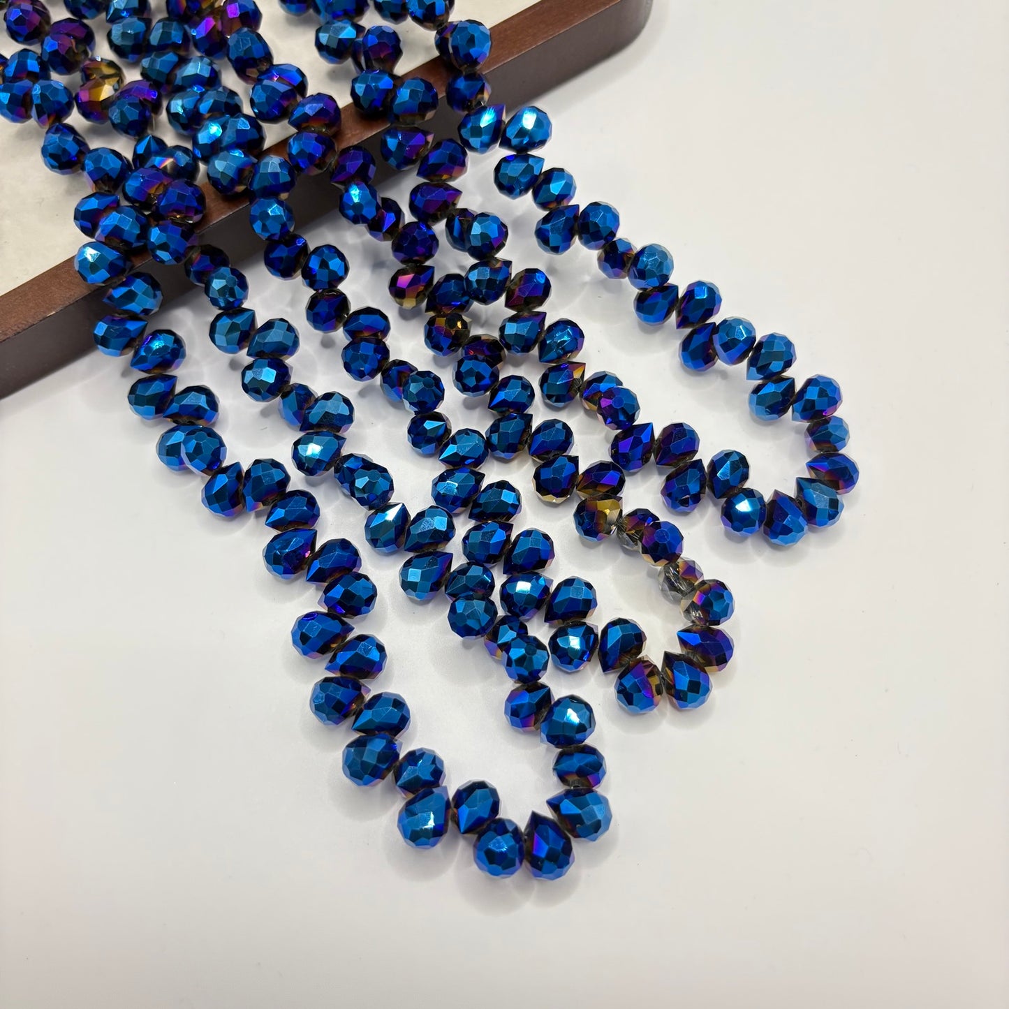 Cobalt Blue 061 fine-cut teardrop bead strand
