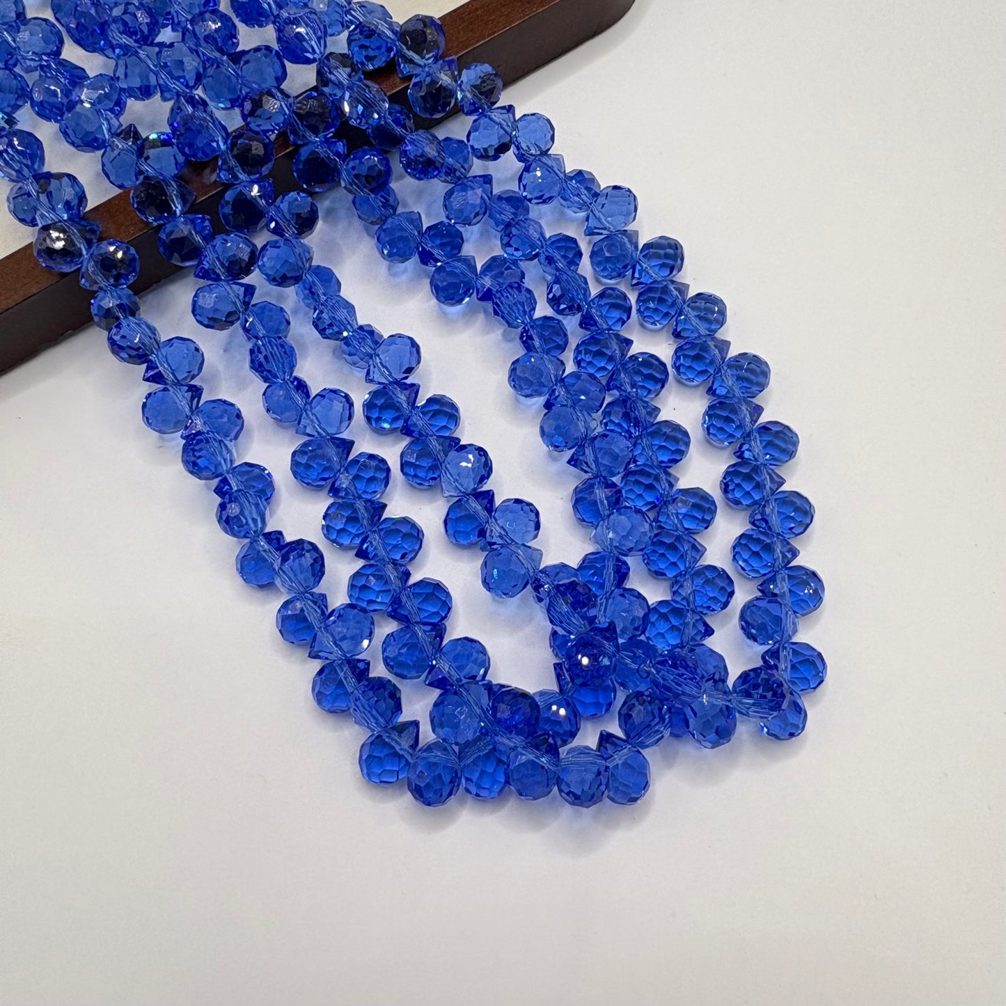 Bright Royal Blue 062 fine-cut teardrop bead strand