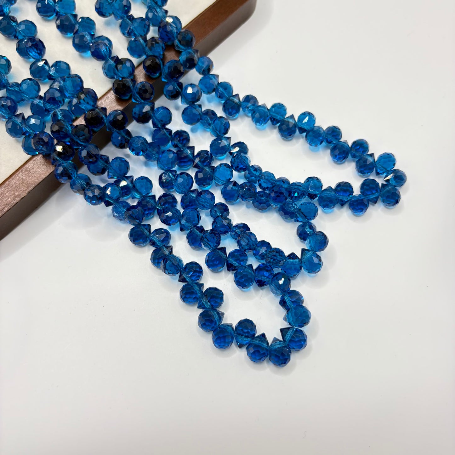 Deep Teal Blue 067 fine-cut teardrop bead strand