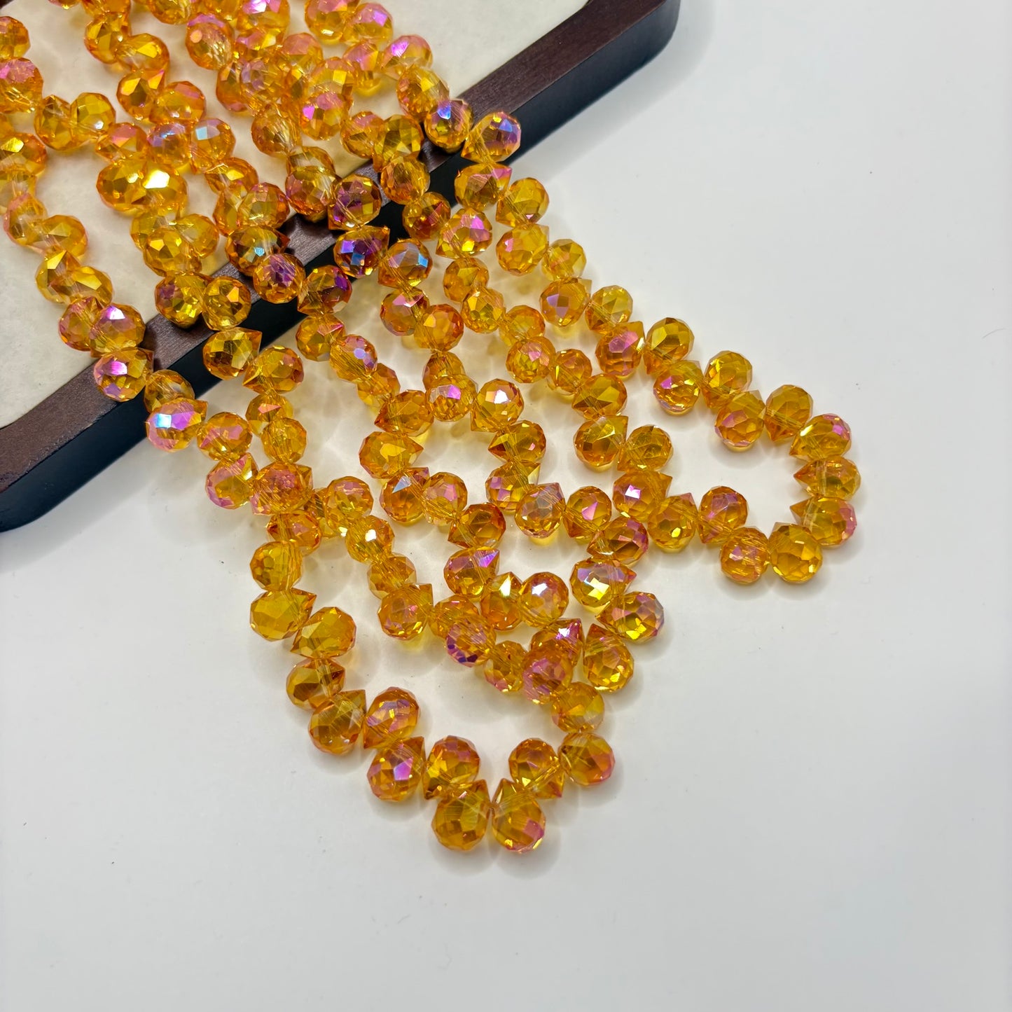Golden Amber 071 fine-cut teardrop bead strand