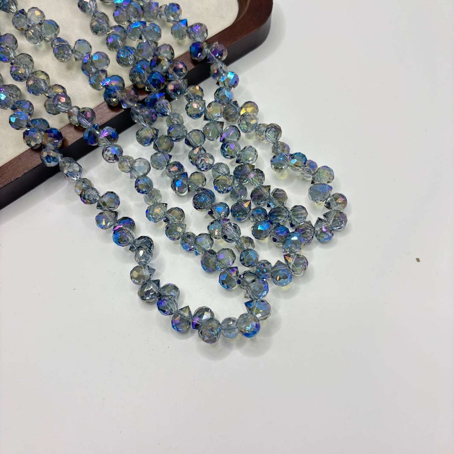 Blue Grey 077 fine-cut teardrop bead strand