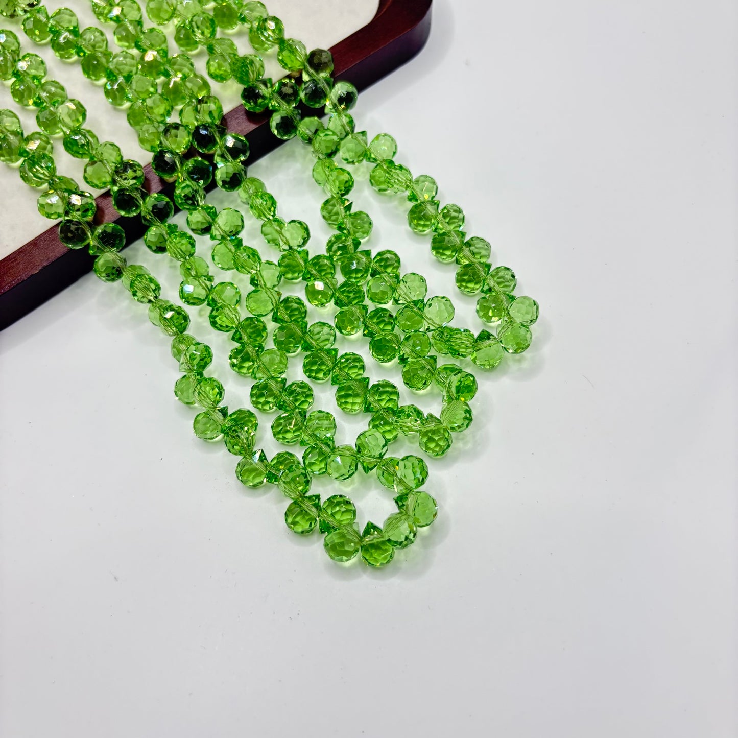 Lime Green 080 fine-cut teardrop bead strand
