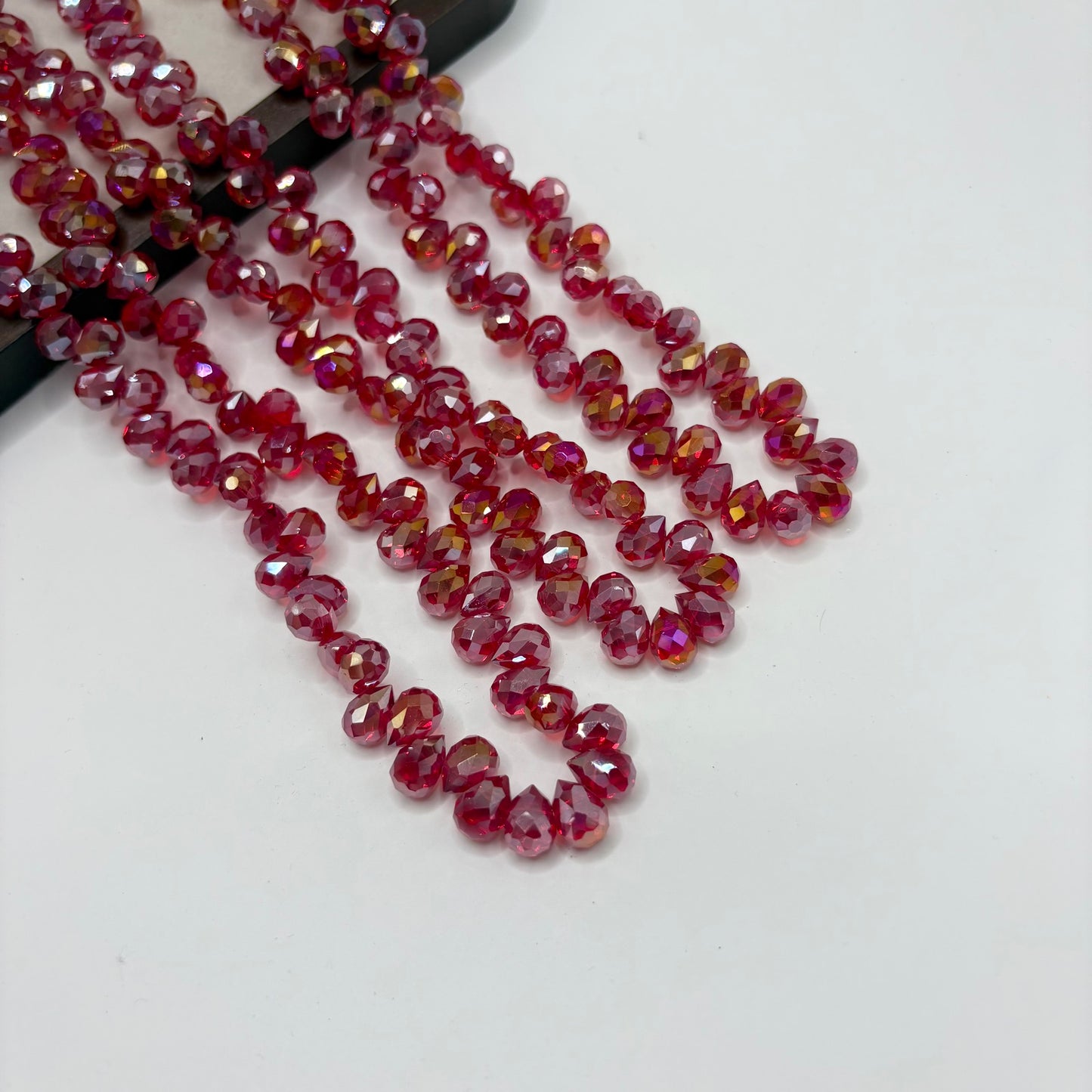 Cherry Red 085 fine-cut teardrop bead strand