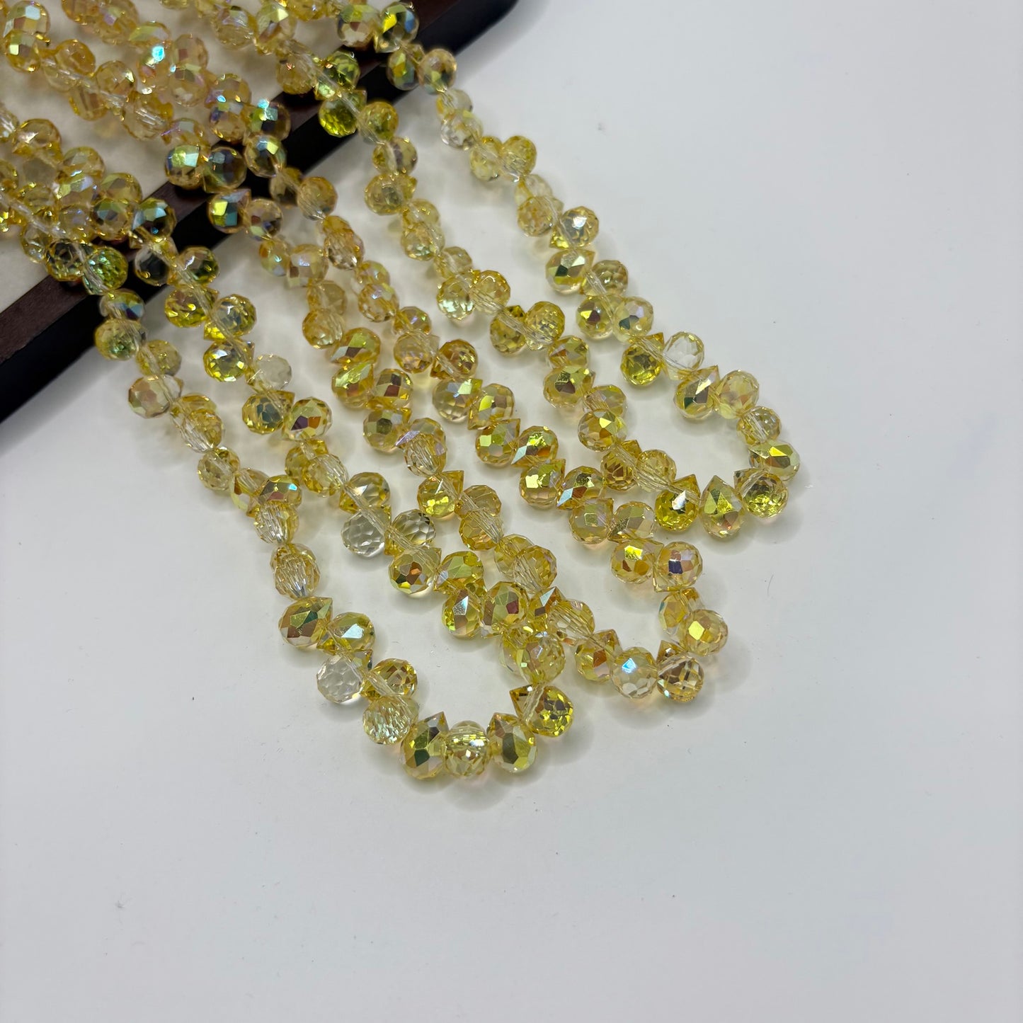 Sunshine Yellow 086 fine-cut teardrop bead strand