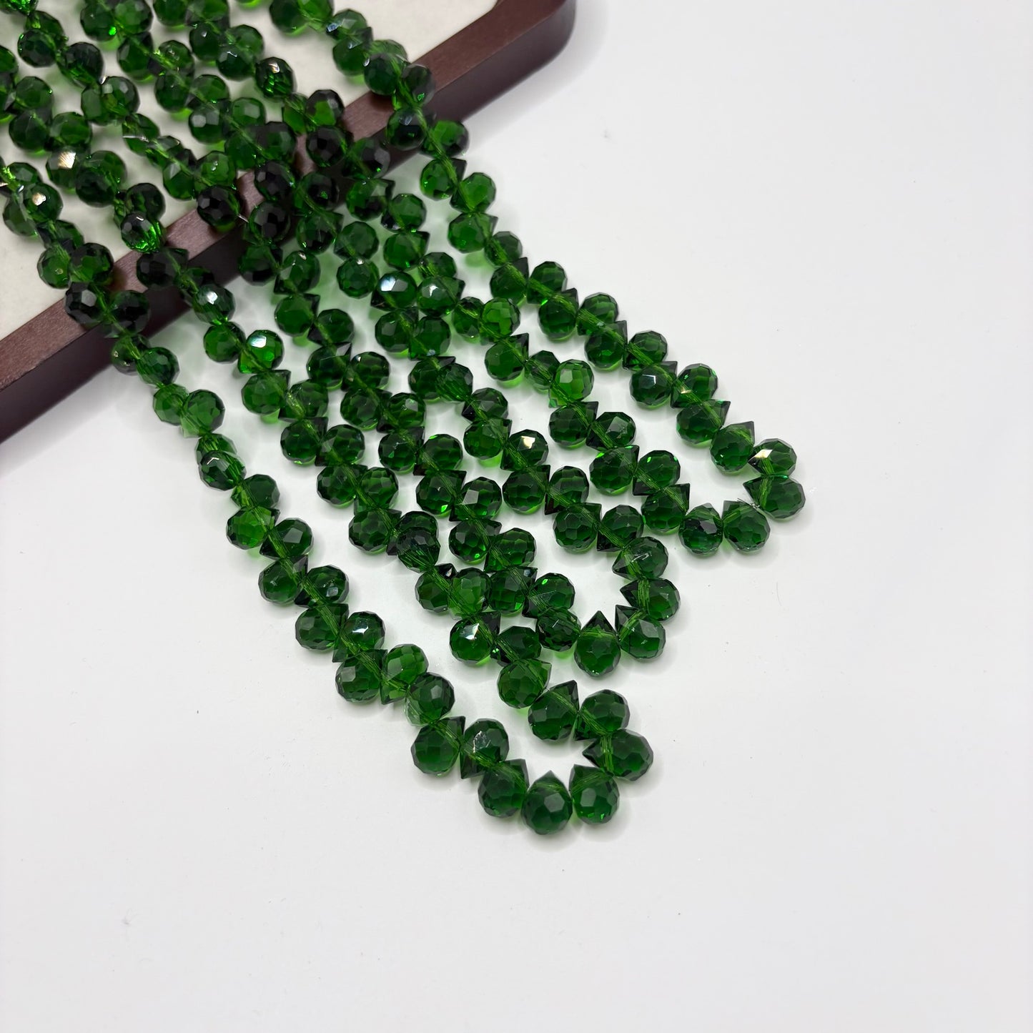 Forest Green 087 fine-cut teardrop bead strand