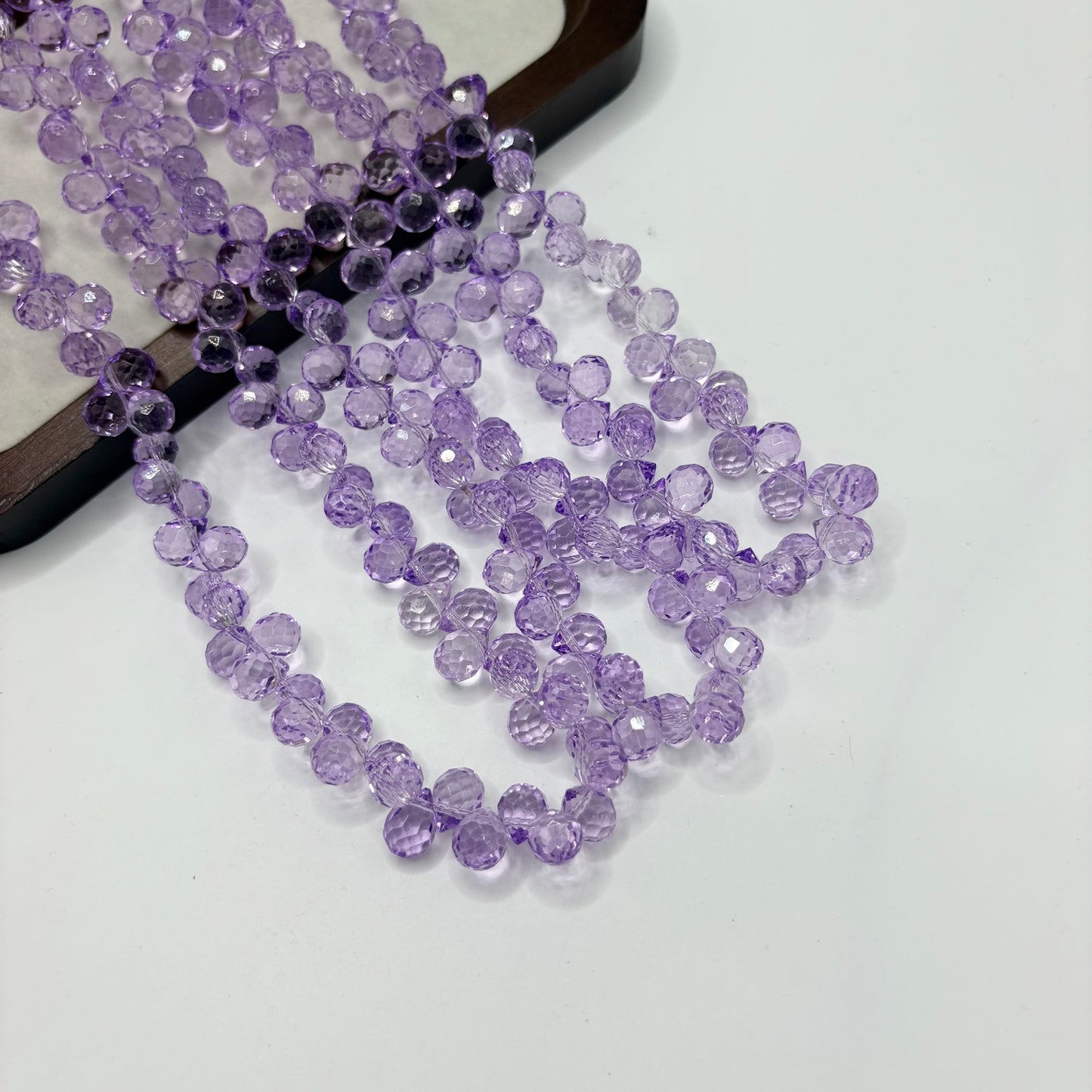 Lavender 088 fine-cut teardrop bead strand
