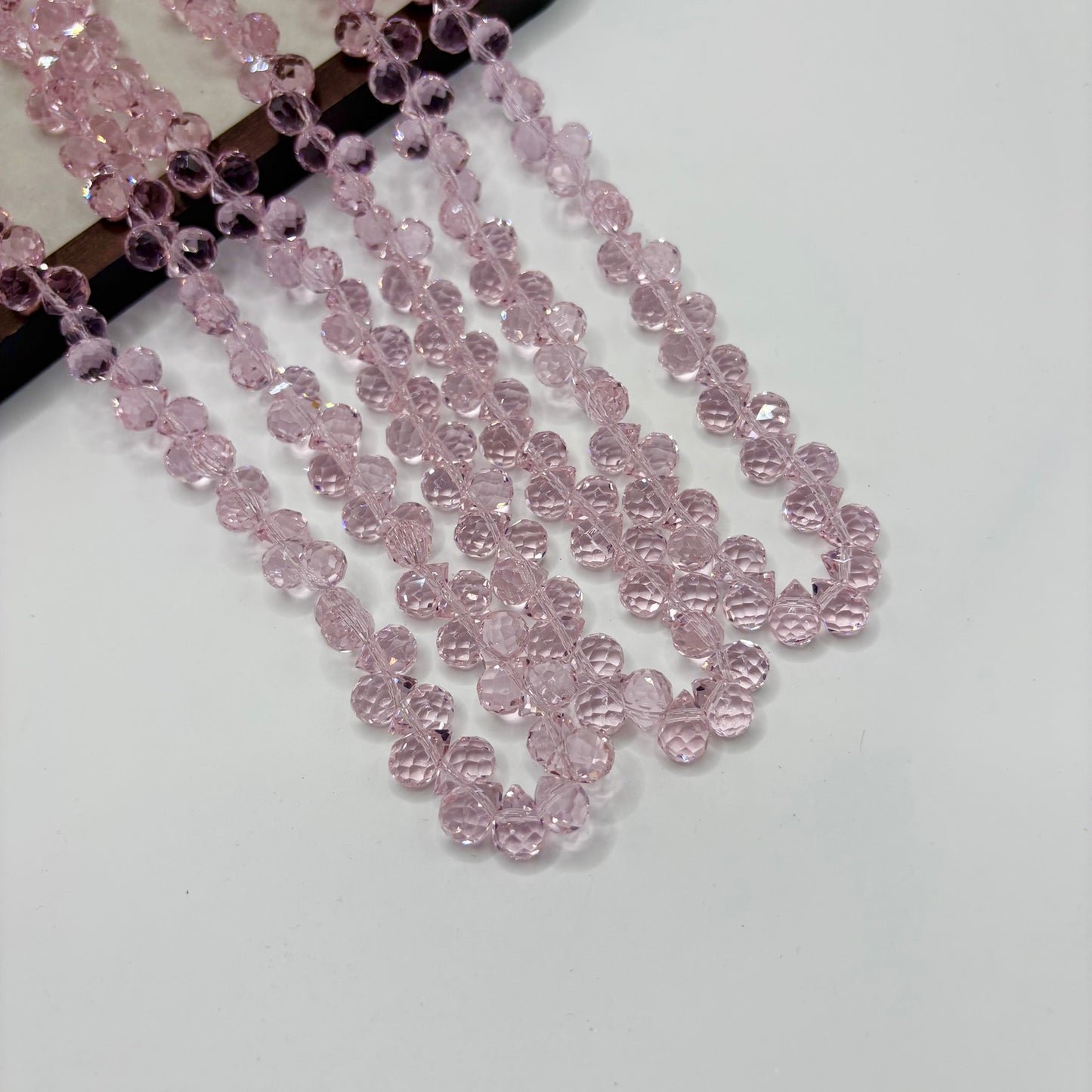 Baby Pink 091 fine-cut teardrop bead strand