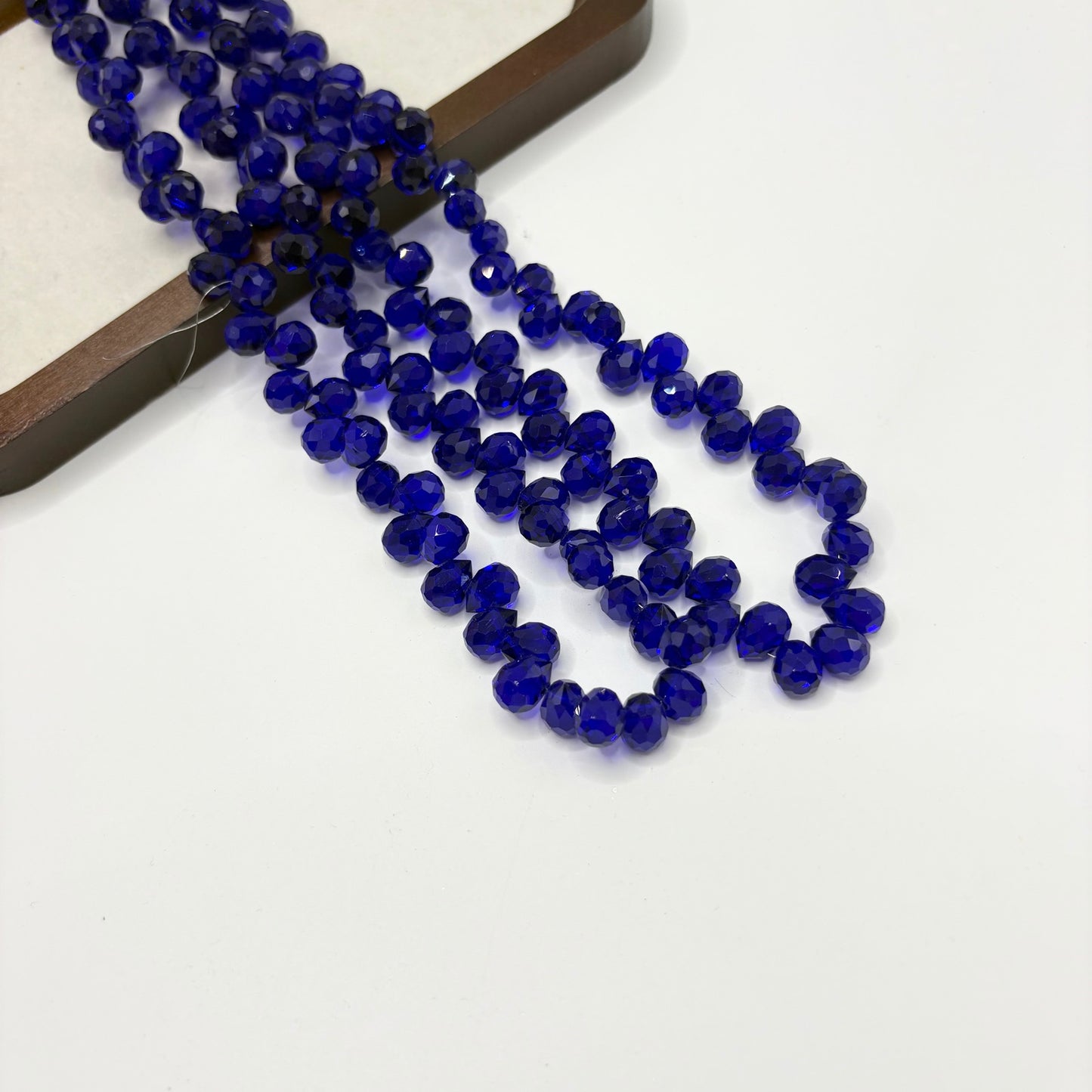 Deep Royal Blue 105 fine-cut teardrop bead strand