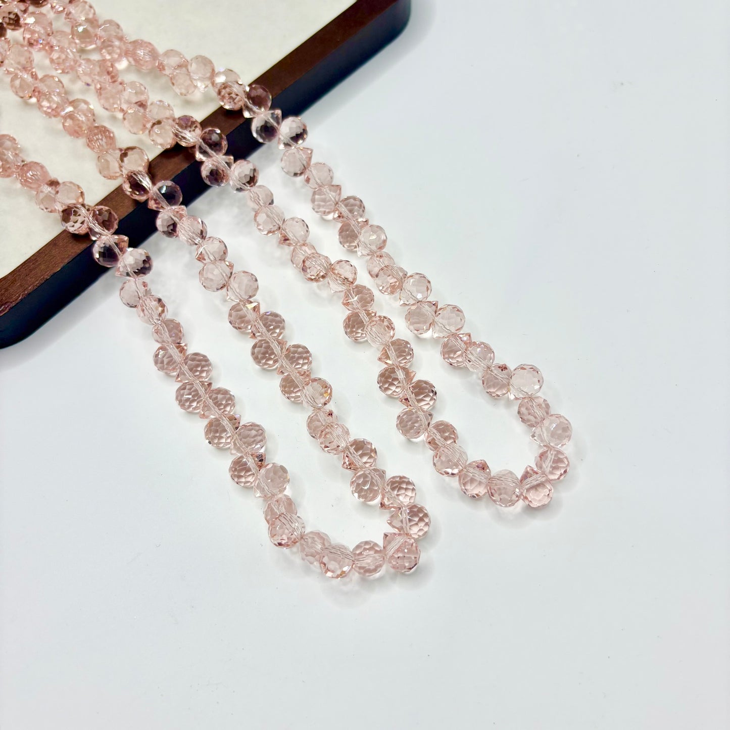 Soft Blush 108 fine-cut teardrop bead strand