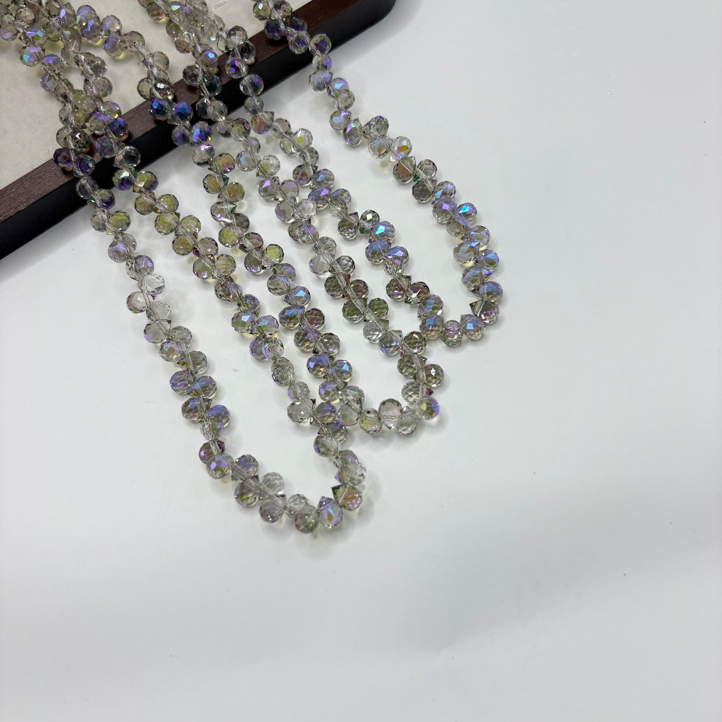 Silver Crystal 110 fine-cut teardrop bead strand